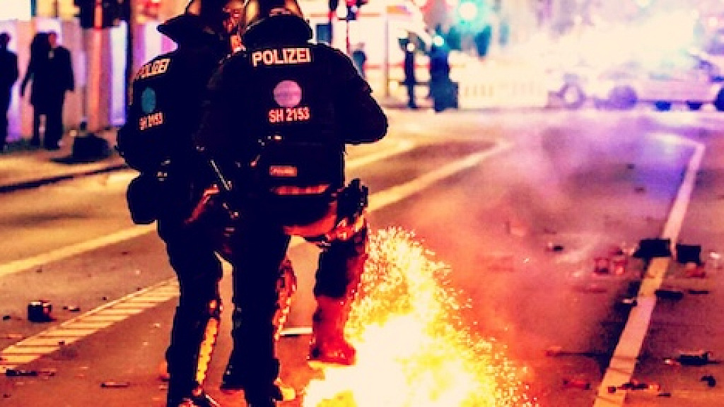 NEW YEAR CHAOS Migrants With Fireworks Attack German Police Set Fire to Cars and Buildings Five Killed in Disturbances Berlin Authorities Blame the Fireworks SHOCK VIDEOS